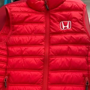 Honda vest , size medium but fits like a small , in excellent condition unisex